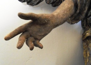 Ángel lampadario. Detalle.